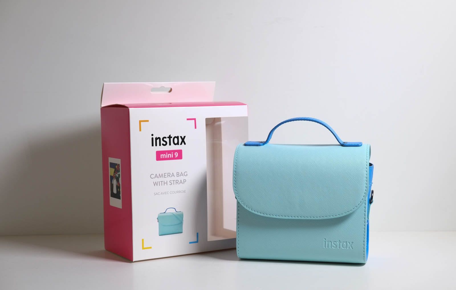 Fujifilm- INSTAX mini 9- CAMERA BAG WITH STRAP- ICE BLUE - Cine Sud è da 48 anni sul mercato!